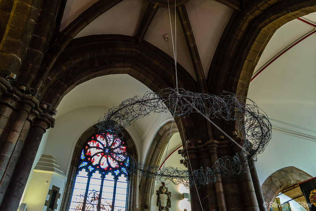 Barbed wire crown for Lent/Easter (1/13 sec at f / 4.0,  ISO 500,  18 mm, 18.0-55.0 mm f/3.5-5.6 ) May 02, 2017