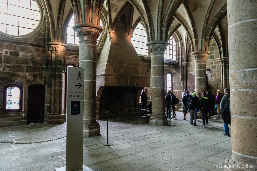 One of two fireplaces and large windows. (1/40 sec at f / 3.5,  ISO 800,  18 mm, 18.0-55.0 mm f/3.5-5.6 ) May 12, 2017