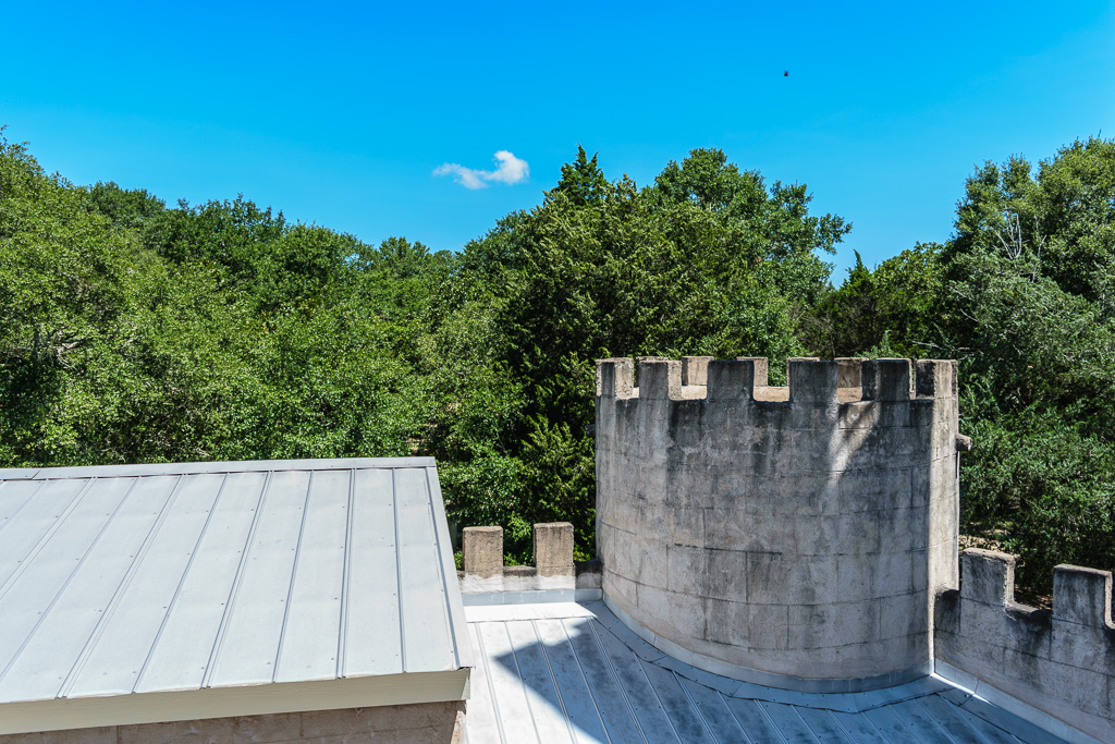 View over roof from lower level of bell tower. (1/500 sec at f / 4.5,  ISO 200,  18 mm, 18.0-55.0 mm f/3.5-5.6 ) July 11, 2019