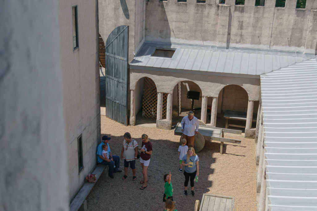 Courtyard from lower level of bell tower. (1/2500 sec at f / 4.5,  ISO 200,  32 mm, 18.0-55.0 mm f/3.5-5.6 ) July 11, 2019