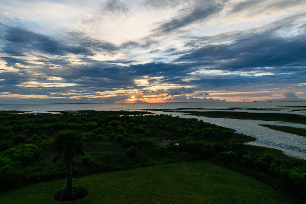 Sunset over Galveston Bay and the wetlands. (1/40 sec at f / 14,  ISO 100,  18 mm, 18.0-55.0 mm f/3.5-5.6 ) June 27, 2017