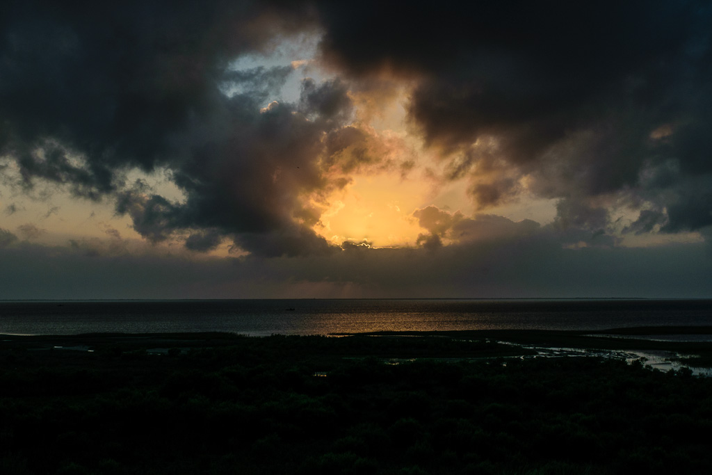 Striking backlit clouds at sunset. (1/320 sec at f / 14,  ISO 100,  38 mm, 18.0-55.0 mm f/3.5-5.6 ) June 29, 2017