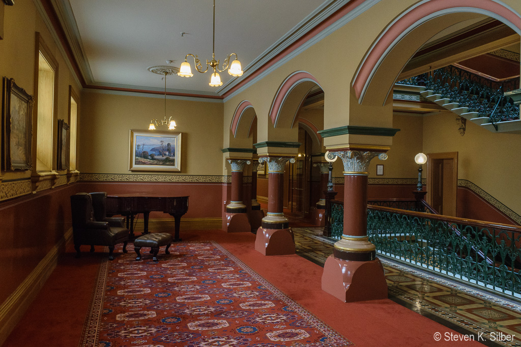 Grand Piano on Second Floor landing (1/20 sec at f / 8.0,  ISO 1600,  18 mm, 18.0-55.0 mm f/3.5-5.6 ) November 13, 2023