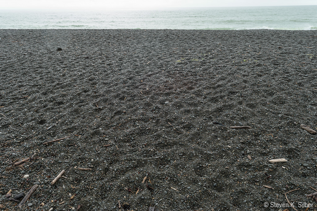 The 'sand' is black - all volcanic in origin. (1/160 sec at f / 9.0,  ISO 200,  18 mm, 18.0-55.0 mm f/3.5-5.6 ) November 22, 2023