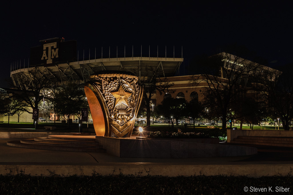 View of Kyle Field from the Aggie Ring Plaza. (1.3 sec at f / 7.1,  ISO 1000,  25 mm, 18.0-55.0 mm f/3.5-5.6 ) February 23, 2017