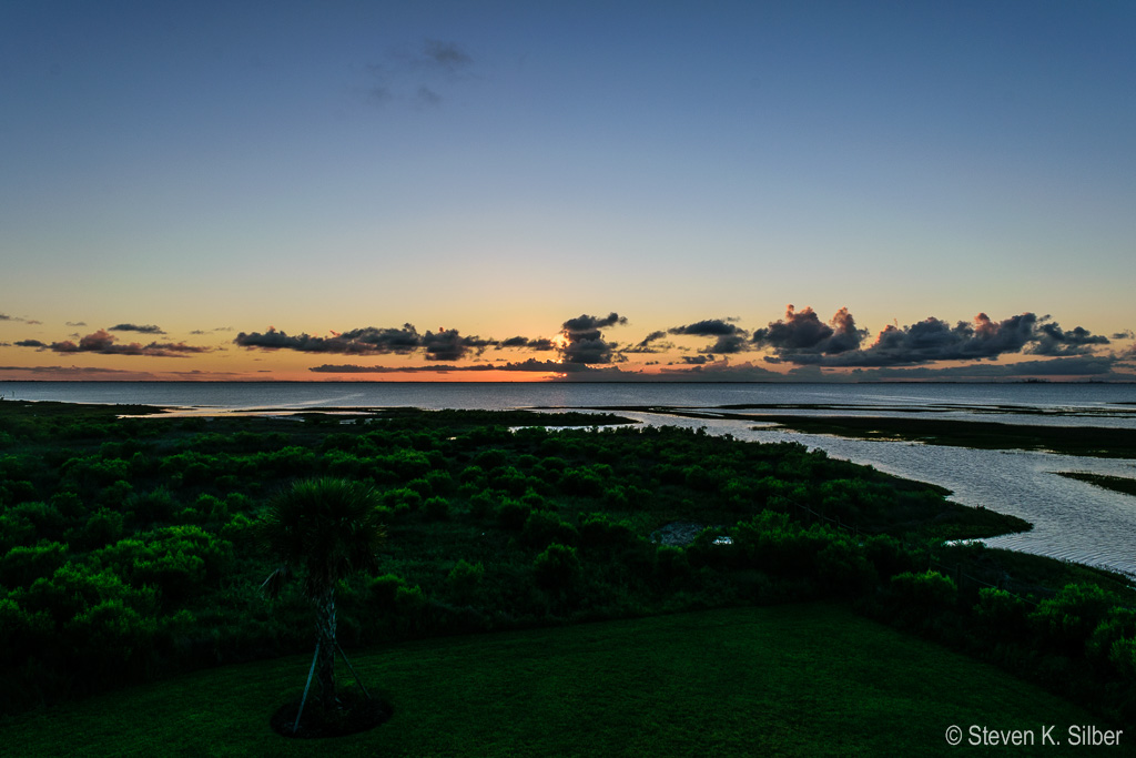 Another sunset behind some storm clouds. (1/80 sec at f / 14,  ISO 100,  18 mm, 18.0-55.0 mm f/3.5-5.6 ) June 28, 2017