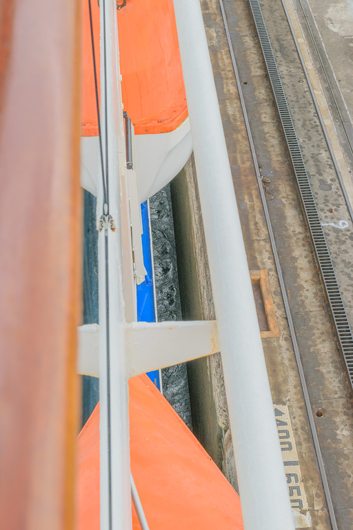In the frist lock,  Tight space between lock and ship.  Track for 'mule' engine. (1/500 sec at f / 10,  ISO 400,  38 mm, 18.0-55.0 mm f/3.5-5.6 ) May 01, 2023